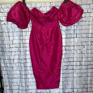 elegantly dupioni silk dress with voluminous sleeves used once.